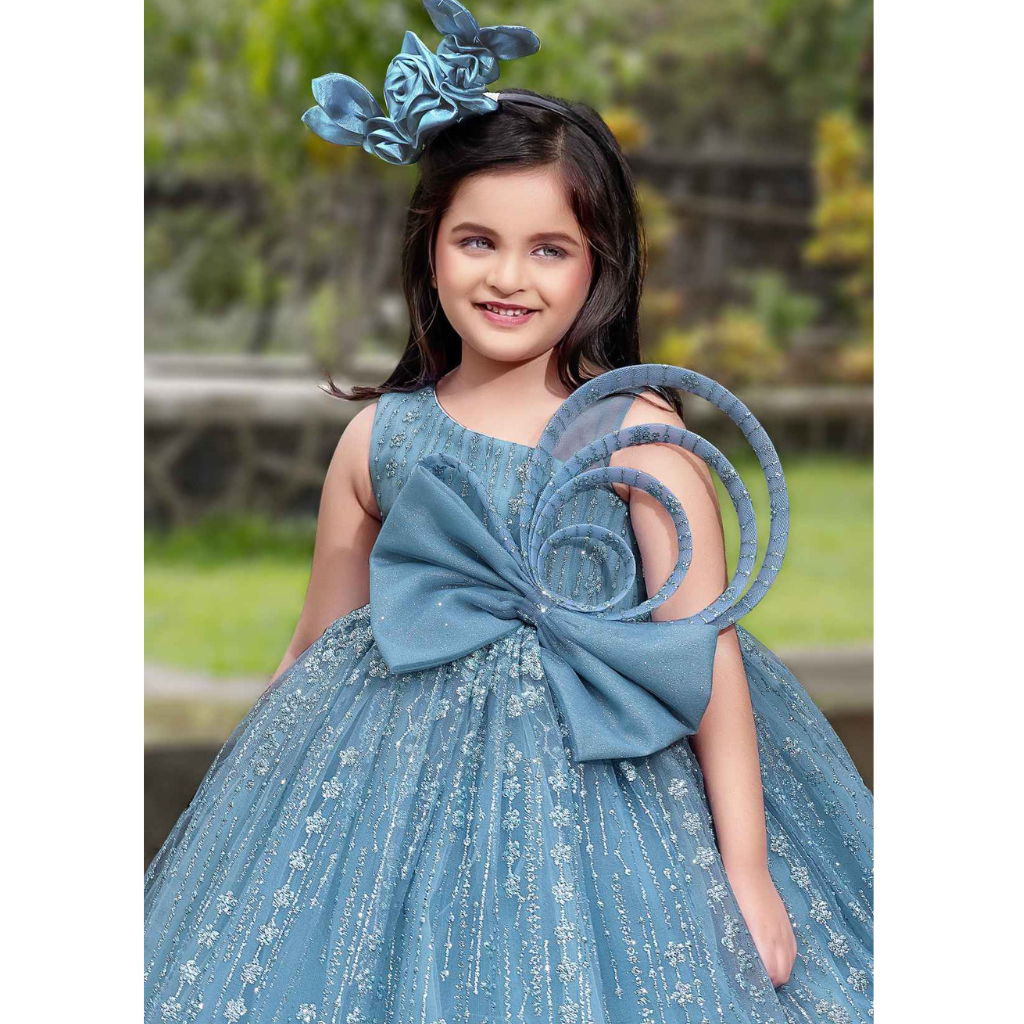 Plum-Party Wear Gown With Bow Embellished And Shimmer Printed For Girls