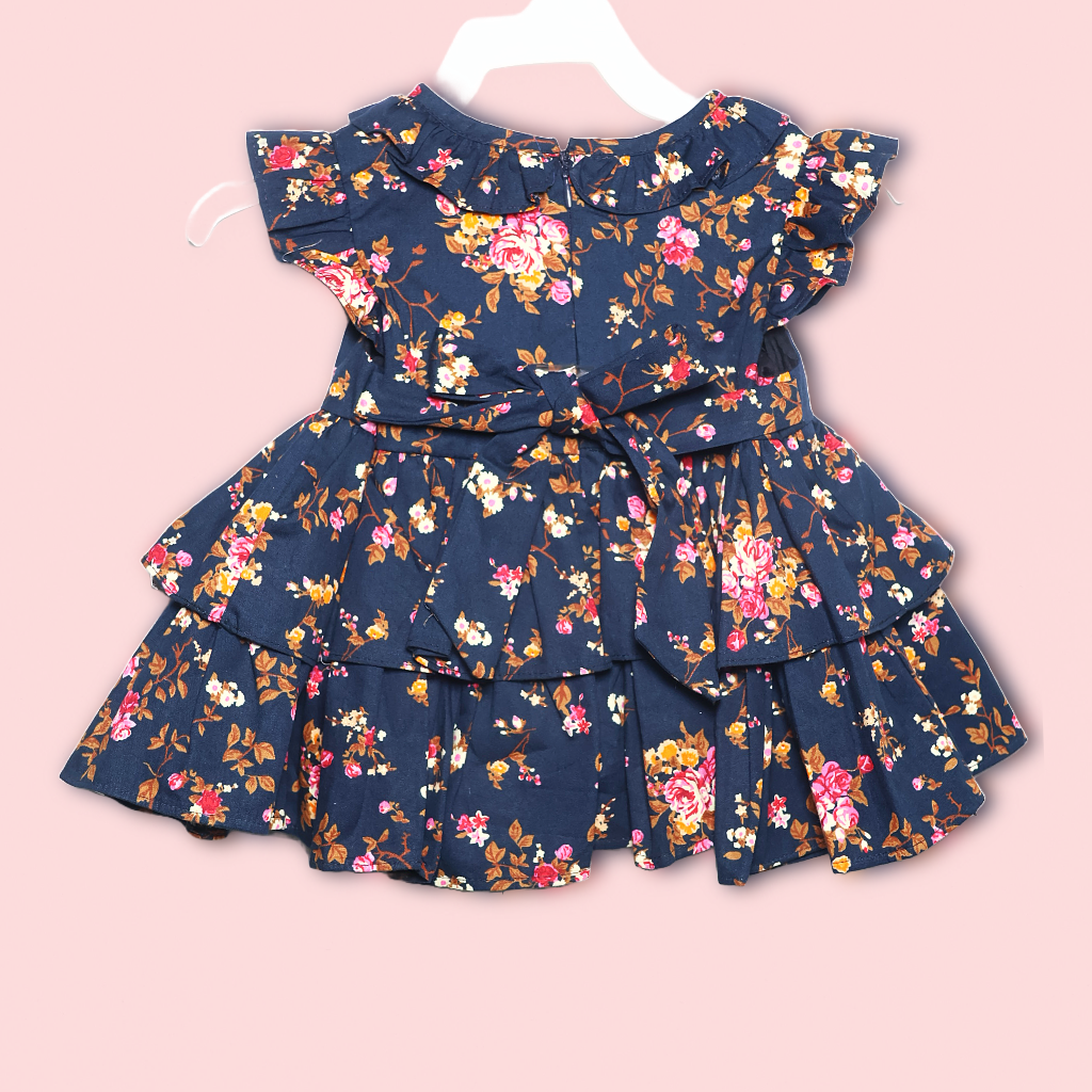 Ninos- Cotton Woven Half Puffed Sleeves Frock with Floral Print & Bow Applique