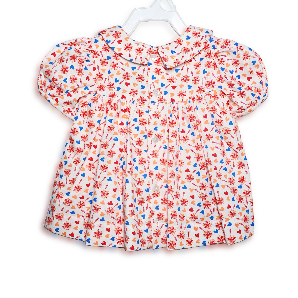 Ninos- Cotton Woven Half Puffed Sleeves Ruffle Frock with Floral Print
