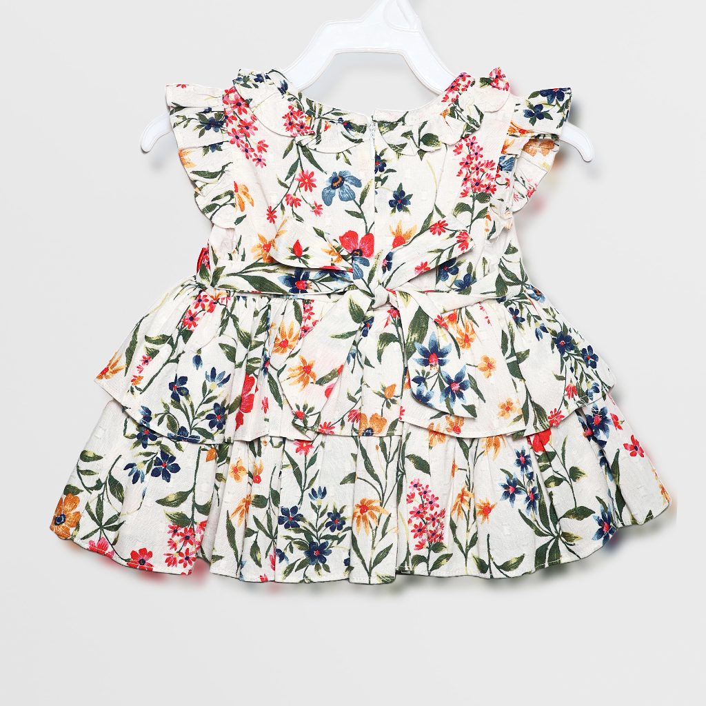 Ninos- Cotton Woven Half Puffed Sleeves Frock with Floral Print & Bow Applique